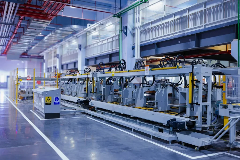 Industrial production line with machinery in a factory hall