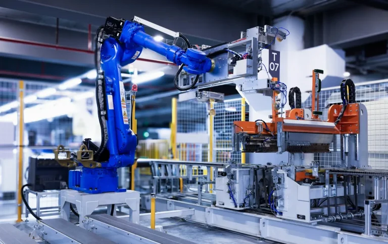 Industrial robot arm on an automation line