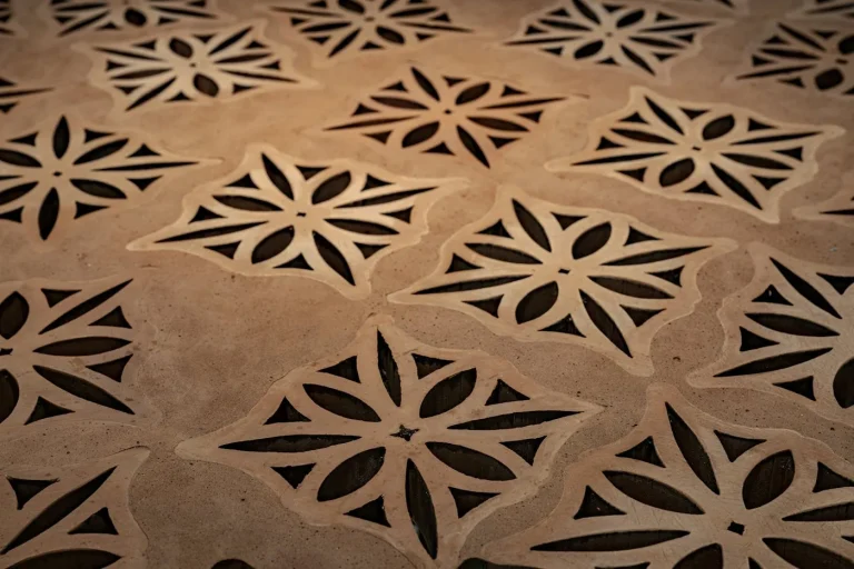 CNC-cut decorative stone panel with geometric pattern