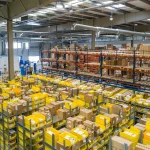 Wholesale warehouse aisles stocked with goods
